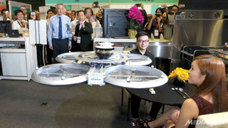 Illustration for article titled Your Flying Robotic Waiter Will Be Right With You